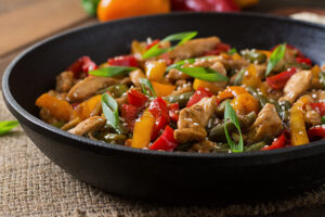 Image of a stir fry with peppers and green beens