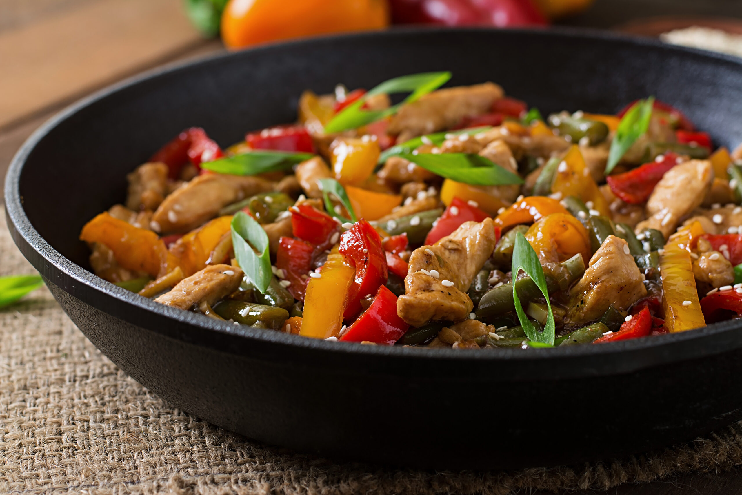 Image of a stir fry with peppers and green beens